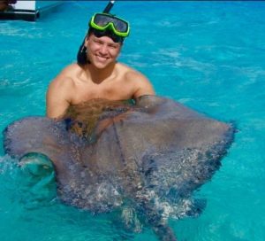 Steven with ray on Grand Cayman